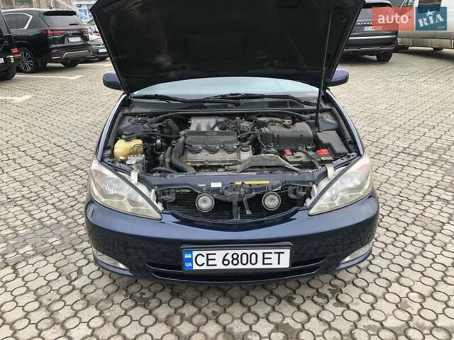 Синій Тойота Камрі, об'ємом двигуна 3 л та пробігом 265 тис. км за 7200 $, фото 71 на Automoto.ua