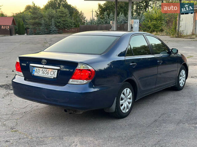 Синий Тойота Камри, объемом двигателя 2.4 л и пробегом 270 тыс. км за 4800 $, фото 1 на Automoto.ua
