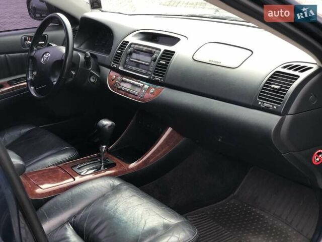 Синій Тойота Камрі, об'ємом двигуна 3 л та пробігом 265 тис. км за 7200 $, фото 60 на Automoto.ua