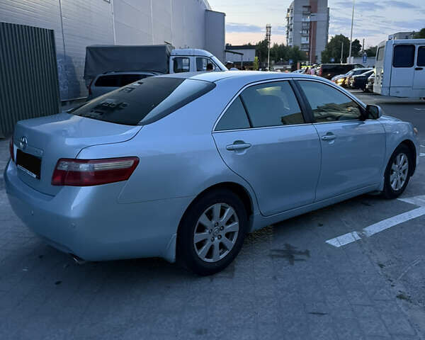 Синій Тойота Камрі, об'ємом двигуна 2.4 л та пробігом 240 тис. км за 8500 $, фото 6 на Automoto.ua