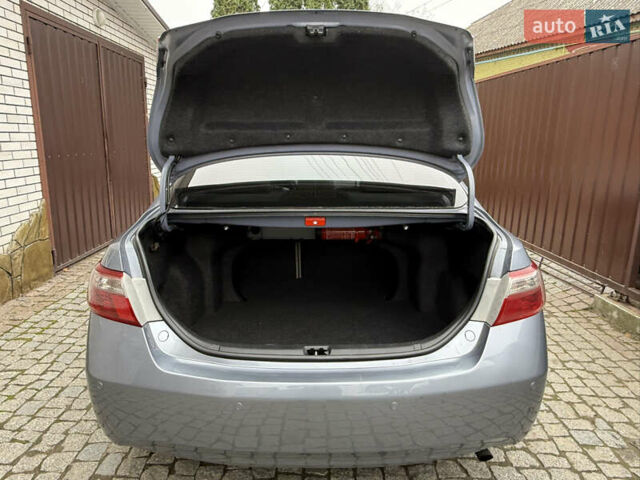 Синий Тойота Камри, объемом двигателя 2.4 л и пробегом 106 тыс. км за 9999 $, фото 46 на Automoto.ua