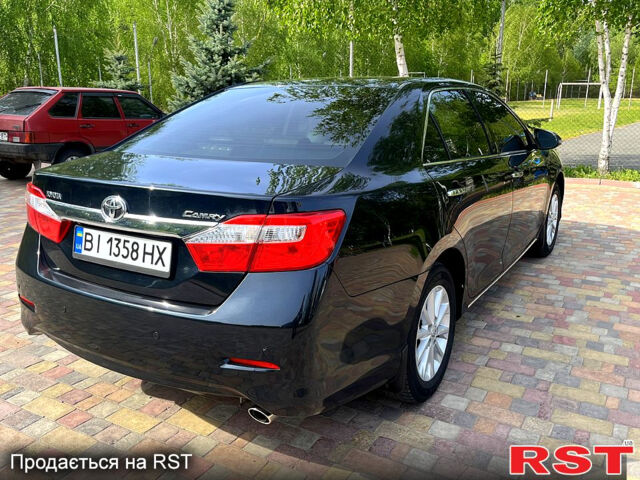 Синий Тойота Камри, объемом двигателя 2.5 л и пробегом 209 тыс. км за 13450 $, фото 3 на Automoto.ua