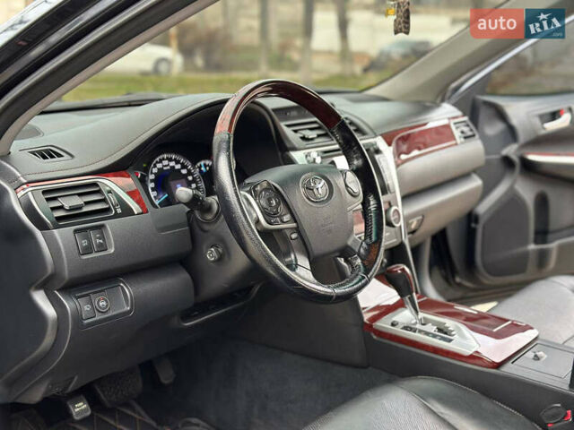 Синій Тойота Камрі, об'ємом двигуна 2.5 л та пробігом 183 тис. км за 11700 $, фото 11 на Automoto.ua