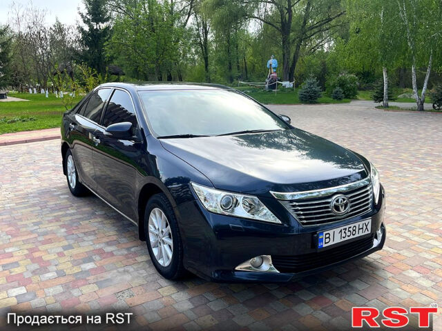 Синий Тойота Камри, объемом двигателя 2.5 л и пробегом 209 тыс. км за 13450 $, фото 1 на Automoto.ua