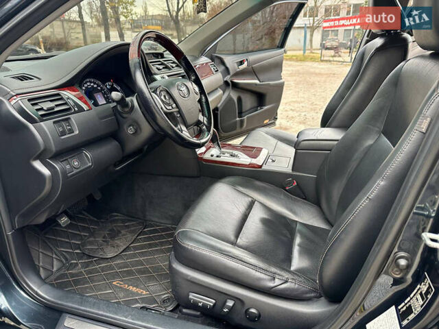 Синій Тойота Камрі, об'ємом двигуна 2.5 л та пробігом 183 тис. км за 11700 $, фото 13 на Automoto.ua