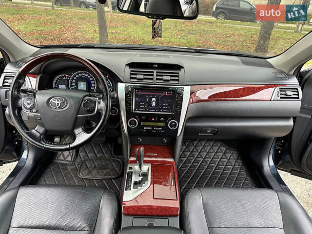 Синій Тойота Камрі, об'ємом двигуна 2.5 л та пробігом 183 тис. км за 11700 $, фото 34 на Automoto.ua