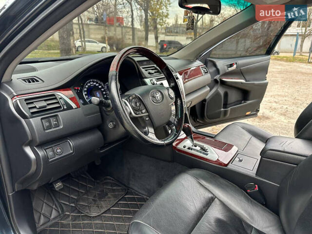 Синій Тойота Камрі, об'ємом двигуна 2.5 л та пробігом 183 тис. км за 11700 $, фото 14 на Automoto.ua