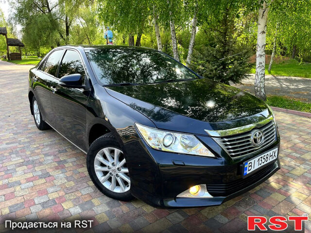 Синий Тойота Камри, объемом двигателя 2.5 л и пробегом 209 тыс. км за 13450 $, фото 12 на Automoto.ua