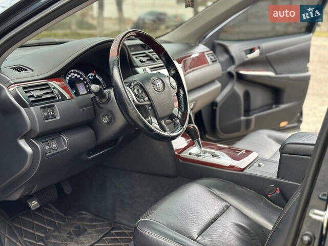 Синій Тойота Камрі, об'ємом двигуна 2.5 л та пробігом 183 тис. км за 11700 $, фото 10 на Automoto.ua