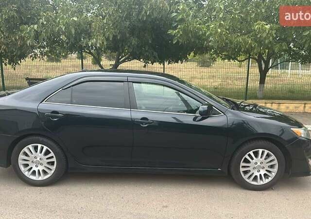 Синий Тойота Камри, объемом двигателя 2.49 л и пробегом 162 тыс. км за 11200 $, фото 8 на Automoto.ua