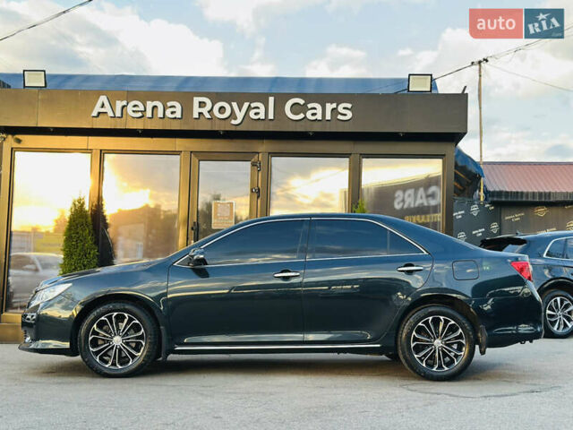 Синій Тойота Камрі, об'ємом двигуна 2.49 л та пробігом 231 тис. км за 12700 $, фото 4 на Automoto.ua