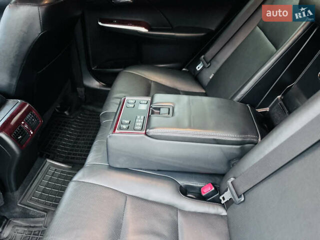 Синій Тойота Камрі, об'ємом двигуна 2.5 л та пробігом 239 тис. км за 14500 $, фото 17 на Automoto.ua