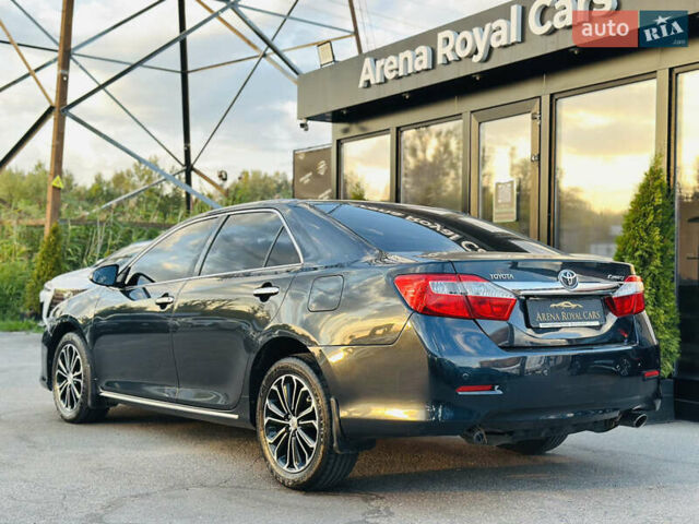 Синій Тойота Камрі, об'ємом двигуна 2.49 л та пробігом 231 тис. км за 12700 $, фото 11 на Automoto.ua