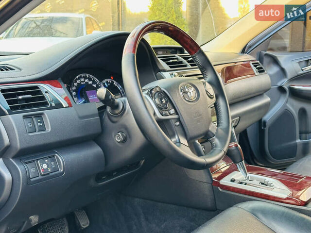 Синій Тойота Камрі, об'ємом двигуна 2.49 л та пробігом 231 тис. км за 12700 $, фото 13 на Automoto.ua