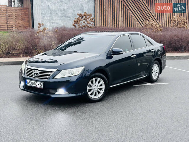 Синій Тойота Камрі, об'ємом двигуна 2.5 л та пробігом 239 тис. км за 14500 $, фото 1 на Automoto.ua