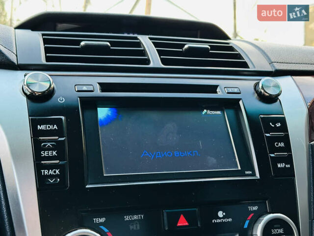 Синій Тойота Камрі, об'ємом двигуна 2.49 л та пробігом 231 тис. км за 12700 $, фото 31 на Automoto.ua