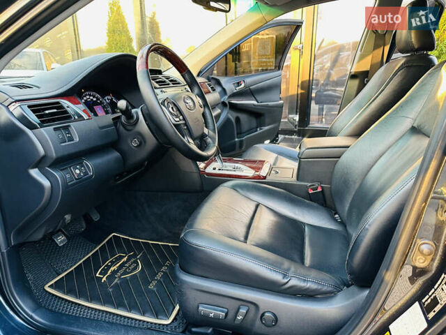 Синій Тойота Камрі, об'ємом двигуна 2.49 л та пробігом 231 тис. км за 12700 $, фото 12 на Automoto.ua