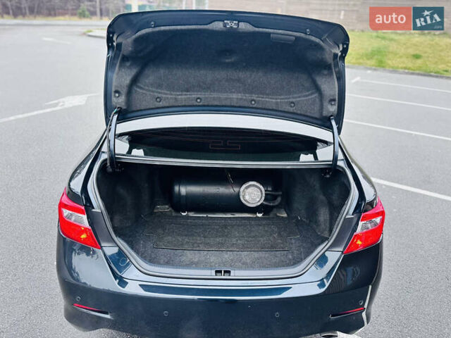 Синій Тойота Камрі, об'ємом двигуна 2.5 л та пробігом 239 тис. км за 14500 $, фото 23 на Automoto.ua