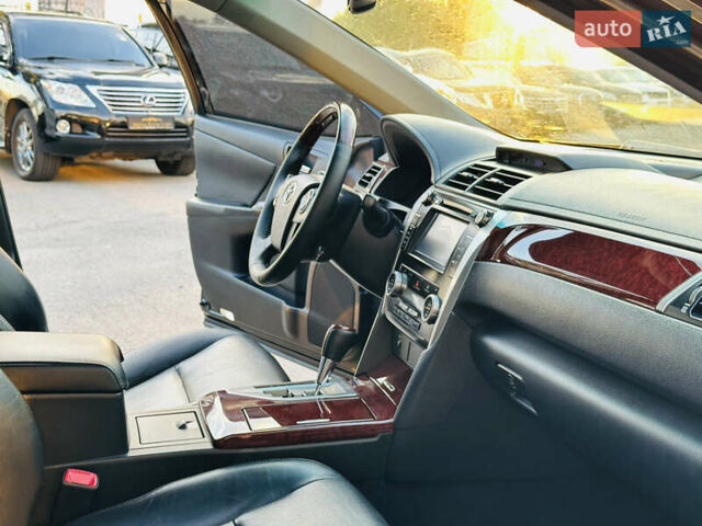 Синій Тойота Камрі, об'ємом двигуна 2.49 л та пробігом 231 тис. км за 12700 $, фото 24 на Automoto.ua