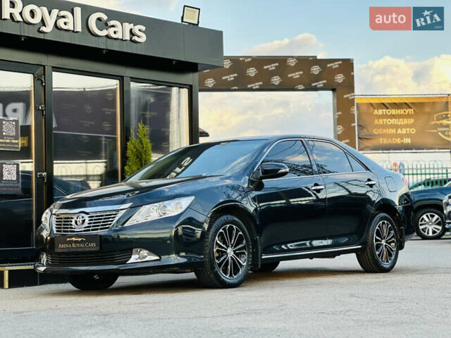 Синій Тойота Камрі, об'ємом двигуна 2.49 л та пробігом 231 тис. км за 12700 $, фото 5 на Automoto.ua