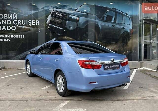 Синій Тойота Камрі, об'ємом двигуна 2.5 л та пробігом 77 тис. км за 15911 $, фото 1 на Automoto.ua