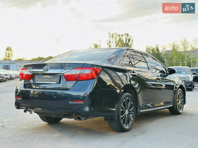 Синій Тойота Камрі, об'ємом двигуна 2.49 л та пробігом 231 тис. км за 12700 $, фото 9 на Automoto.ua