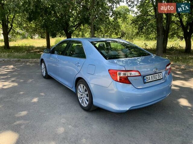 Синій Тойота Камрі, об'ємом двигуна 2.5 л та пробігом 137 тис. км за 14000 $, фото 7 на Automoto.ua