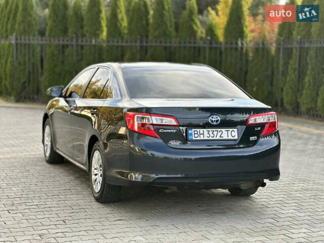 Синий Тойота Камри, объемом двигателя 2.49 л и пробегом 232 тыс. км за 12700 $, фото 3 на Automoto.ua