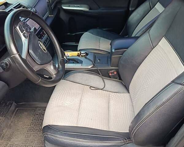 Синий Тойота Камри, объемом двигателя 2.49 л и пробегом 224 тыс. км за 10900 $, фото 3 на Automoto.ua