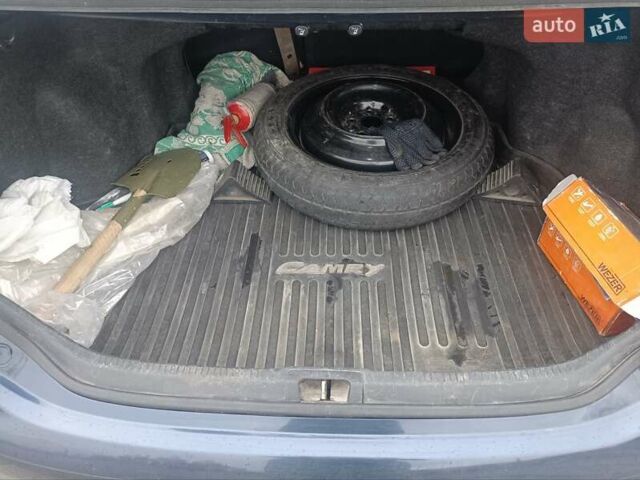Синий Тойота Камри, объемом двигателя 2.5 л и пробегом 157 тыс. км за 12000 $, фото 11 на Automoto.ua