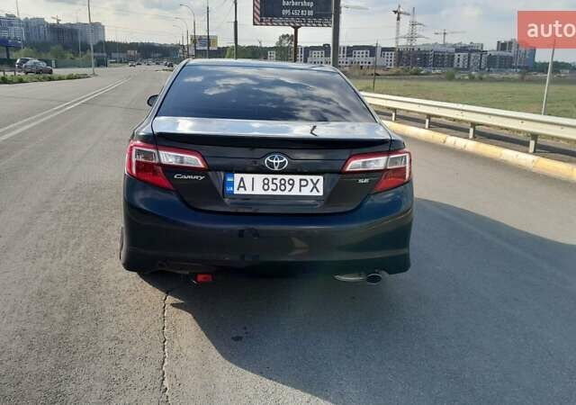 Синий Тойота Камри, объемом двигателя 2.5 л и пробегом 225 тыс. км за 11900 $, фото 9 на Automoto.ua