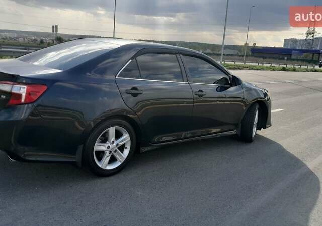 Синий Тойота Камри, объемом двигателя 2.5 л и пробегом 225 тыс. км за 11900 $, фото 7 на Automoto.ua