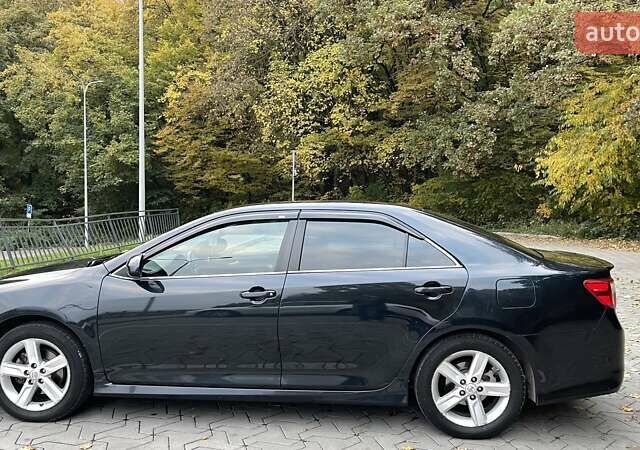 Синий Тойота Камри, объемом двигателя 2.49 л и пробегом 247 тыс. км за 14000 $, фото 9 на Automoto.ua
