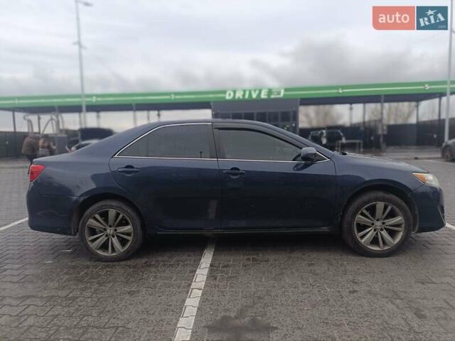 Синий Тойота Камри, объемом двигателя 2.5 л и пробегом 157 тыс. км за 12000 $, фото 2 на Automoto.ua