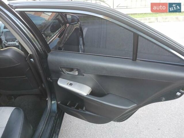 Синий Тойота Камри, объемом двигателя 2.5 л и пробегом 169 тыс. км за 11500 $, фото 25 на Automoto.ua