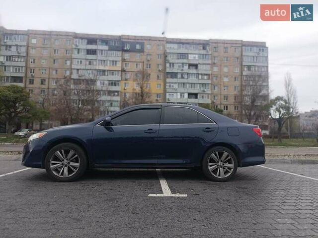 Синий Тойота Камри, объемом двигателя 2.5 л и пробегом 157 тыс. км за 12000 $, фото 1 на Automoto.ua