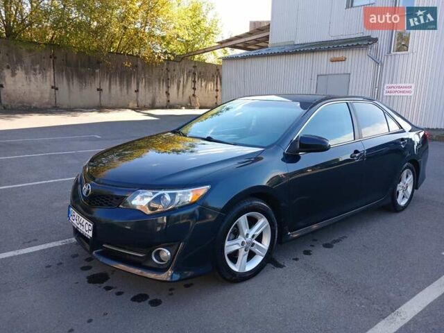 Синий Тойота Камри, объемом двигателя 2.5 л и пробегом 169 тыс. км за 11500 $, фото 4 на Automoto.ua