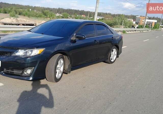 Синий Тойота Камри, объемом двигателя 2.5 л и пробегом 225 тыс. км за 11900 $, фото 6 на Automoto.ua