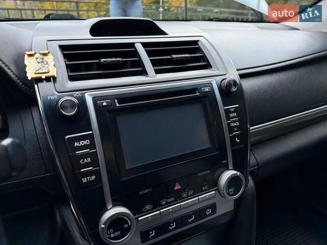 Синий Тойота Камри, объемом двигателя 2.49 л и пробегом 247 тыс. км за 14000 $, фото 29 на Automoto.ua