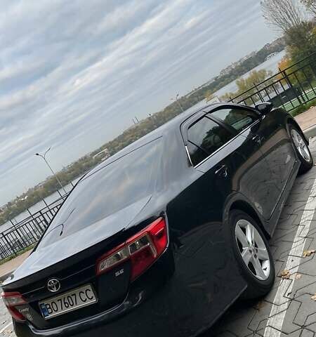 Синий Тойота Камри, объемом двигателя 2.49 л и пробегом 247 тыс. км за 14000 $, фото 7 на Automoto.ua