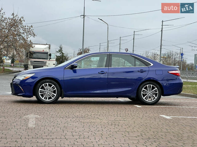 Синий Тойота Камри, объемом двигателя 2.5 л и пробегом 176 тыс. км за 12900 $, фото 1 на Automoto.ua