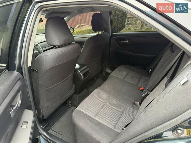 Синій Тойота Камрі, об'ємом двигуна 2.49 л та пробігом 205 тис. км за 13500 $, фото 10 на Automoto.ua