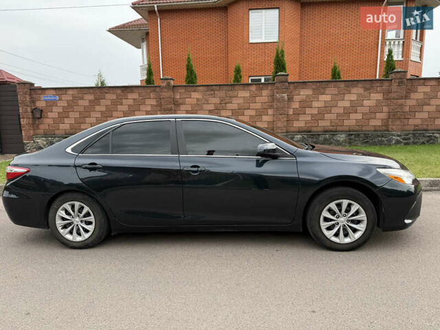 Синій Тойота Камрі, об'ємом двигуна 2.49 л та пробігом 205 тис. км за 13500 $, фото 2 на Automoto.ua