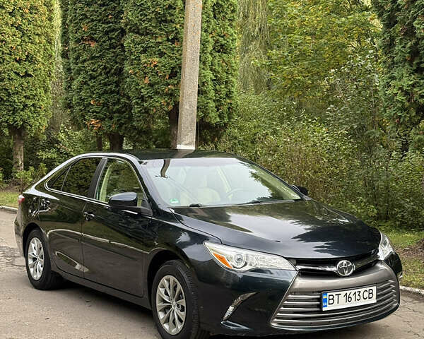 Синий Тойота Камри, объемом двигателя 2.49 л и пробегом 74 тыс. км за 13500 $, фото 3 на Automoto.ua