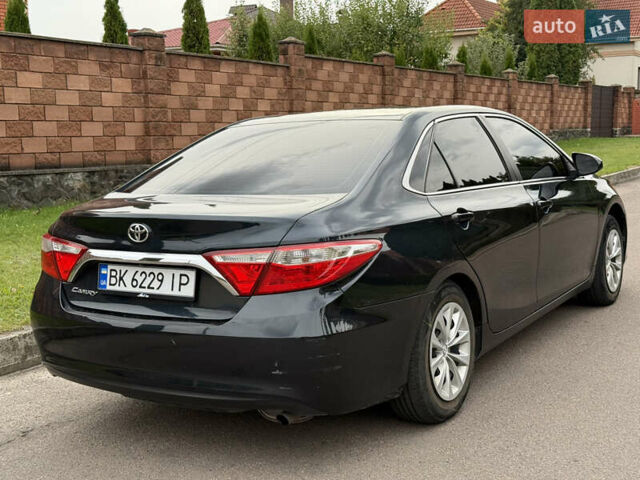 Синій Тойота Камрі, об'ємом двигуна 2.49 л та пробігом 205 тис. км за 13500 $, фото 3 на Automoto.ua