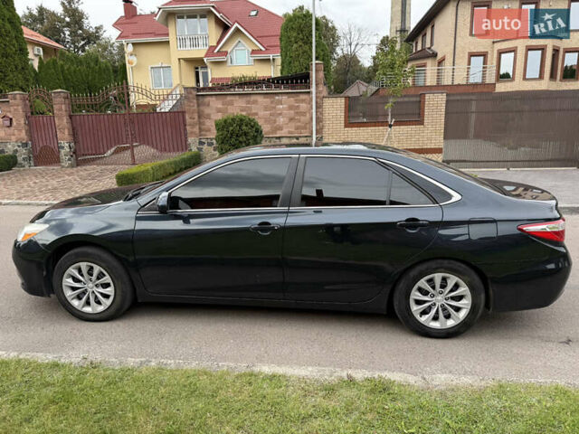 Синій Тойота Камрі, об'ємом двигуна 2.49 л та пробігом 205 тис. км за 13500 $, фото 6 на Automoto.ua