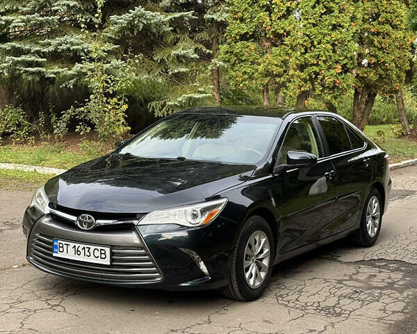 Синий Тойота Камри, объемом двигателя 2.49 л и пробегом 74 тыс. км за 13500 $, фото 5 на Automoto.ua