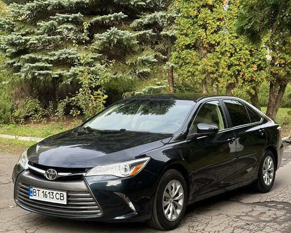 Синий Тойота Камри, объемом двигателя 2.49 л и пробегом 74 тыс. км за 13500 $, фото 2 на Automoto.ua