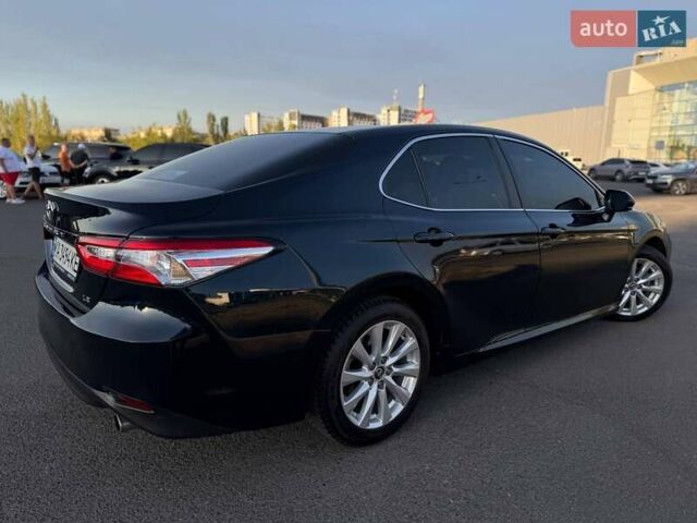 Синій Тойота Камрі, об'ємом двигуна 2.49 л та пробігом 145 тис. км за 19500 $, фото 21 на Automoto.ua