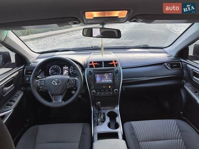 Синий Тойота Камри, объемом двигателя 2.5 л и пробегом 170 тыс. км за 12900 $, фото 37 на Automoto.ua